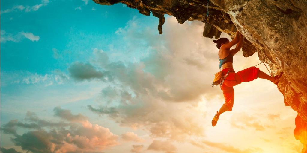 woman rock climbing